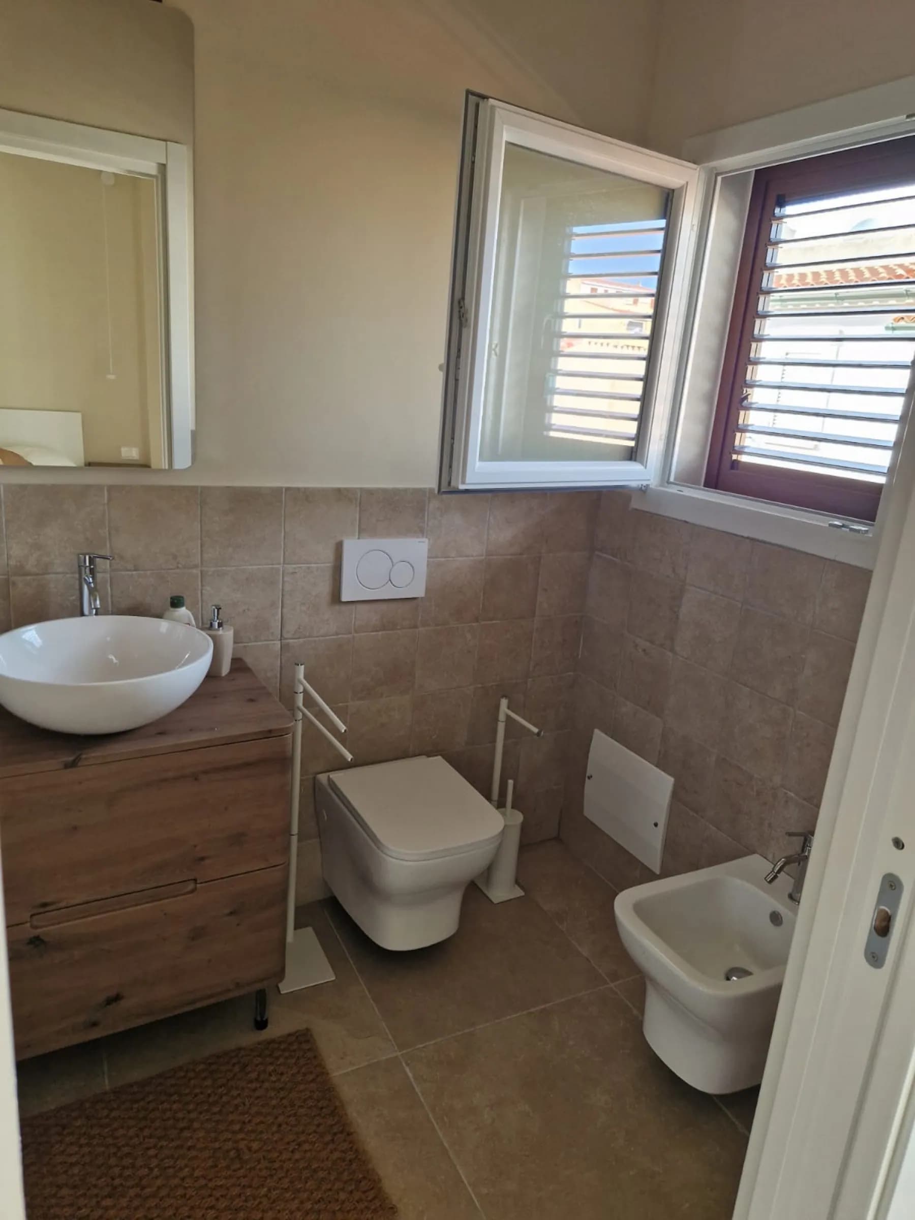 Salle de bain attenante à la chambre